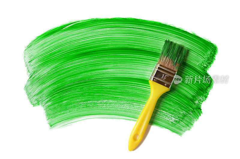 油漆刷与绿色油漆(隔离在白色)