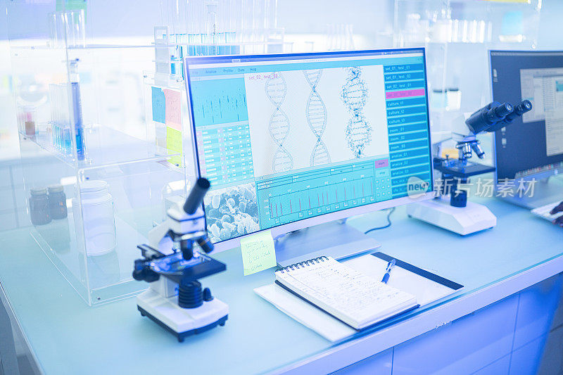 未来的实验室设备。电脑屏幕上的DNA研究