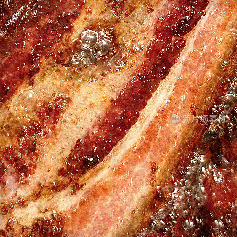 新鲜煎滋脆脆的美味猪肉肚培根片细节高分辨率库存图像