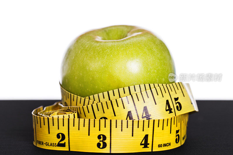 卷尺和苹果:保持身材意味着健康饮食