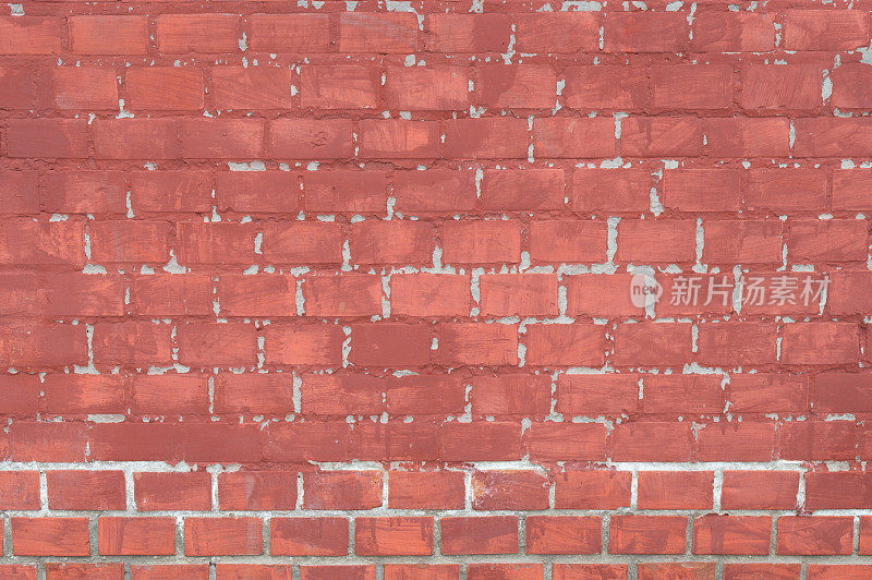风化，磨损的砖墙漆成红色