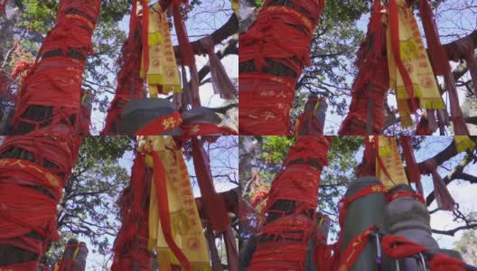 中国陕西，庙里，红丝带系在木棒上。高清在线视频素材下载