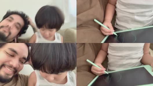 亚洲家庭与快乐的儿子在家里玩高清在线视频素材下载