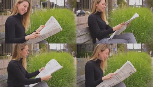 慢镜头中，女人们坐在路边的长椅上看报纸高清在线视频素材下载