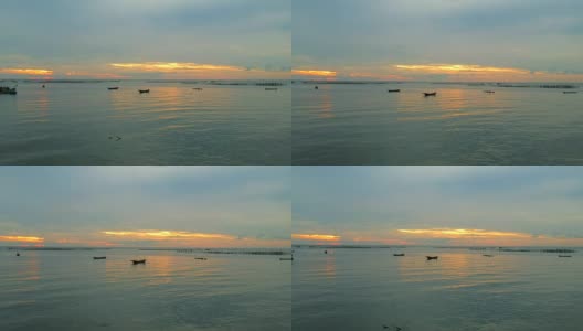 鸟瞰图捕鱼吹嘘在日落在昂西拉海滩泰国高清在线视频素材下载