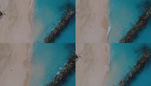特克斯和凯科斯群岛，普罗维登夏莱斯，格雷斯湾码头的无人机下降空中高清在线视频素材下载