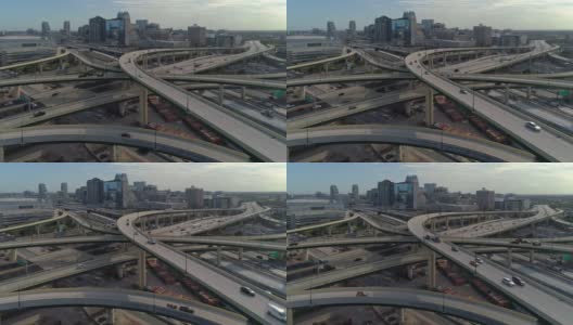 清晨，从空中俯瞰奥兰多市中心，高速公路和多个立交桥的巨大交通枢纽。高清在线视频素材下载
