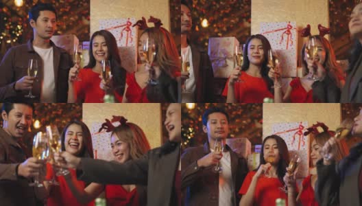 一位亚洲商务同事在平安夜的派对上用香槟畅饮高清在线视频素材下载
