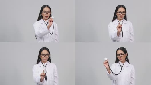 美丽的亚洲晒黑皮肤女医生白色衬衫西装与听诊器在颈部和检查听心脏脉搏姿势高清在线视频素材下载