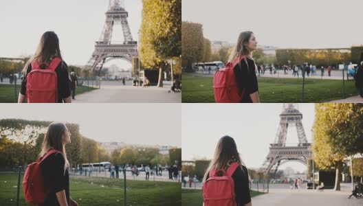 年轻快乐的女人背着双肩包独自走在埃菲尔铁塔和火星champs附近，法国巴黎高清在线视频素材下载