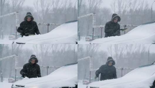 Man cleaning snow from car高清在线视频素材下载