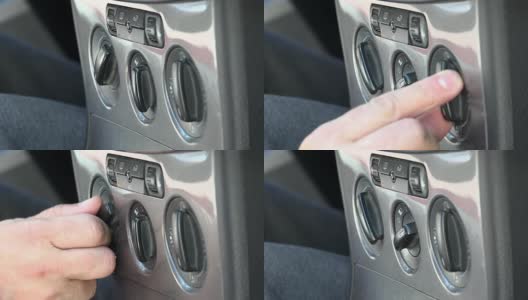 手动调节汽车的气候控制按钮高清在线视频素材下载