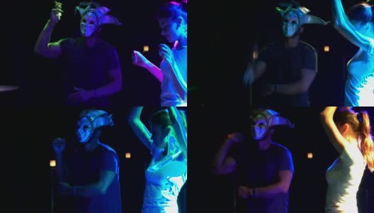 Flythrough拍摄的活力四射的派对上的人在俱乐部跳舞高清在线视频素材下载