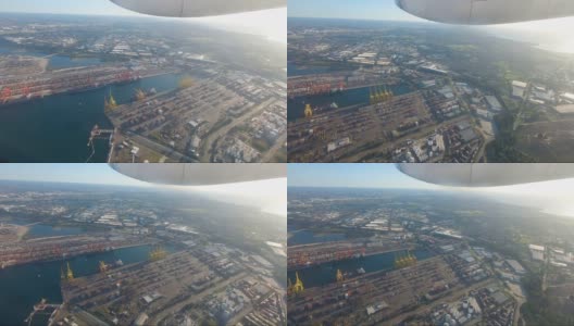 小型通勤飞机从悉尼机场起飞后穿过工业区高清在线视频素材下载