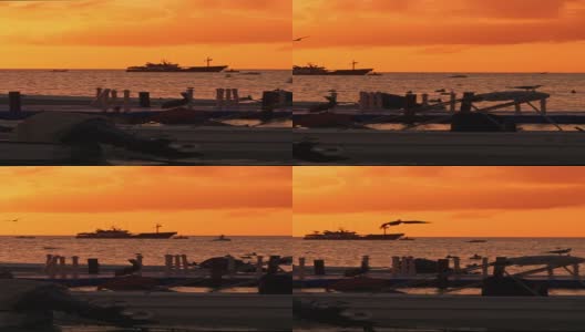 加勒比海岛屿的日落，停泊着渔船高清在线视频素材下载