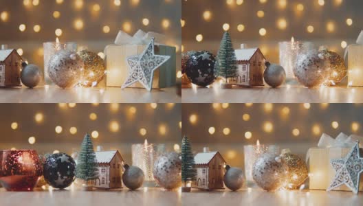 圣诞节背景有明亮的圣诞树玩具、漂亮的散景、玩具屋和蜡烛。圣诞节假期家庭舒适的概念高清在线视频素材下载