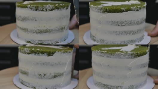 准备一个多层的绿色海绵菠菜蛋糕。应用奶油高清在线视频素材下载