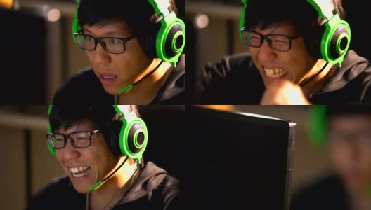 亚洲男性玩家庆祝他在电脑游戏战斗中获胜高清在线视频素材下载