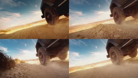 在非洲沙漠的小路上。轮胎上的花纹特写。高清在线视频素材下载