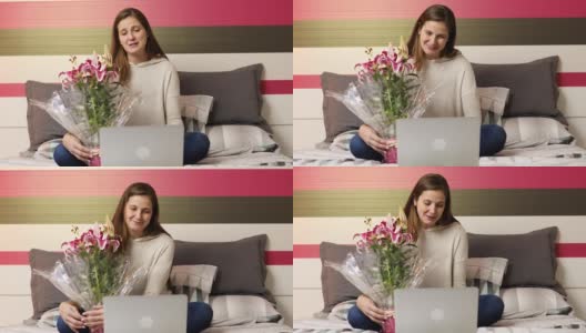 一个女人在和男友视频通话庆祝情人节高清在线视频素材下载