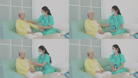 护士在家测量老年患者的体温，了解老年人心脏病保健的概念高清在线视频素材下载