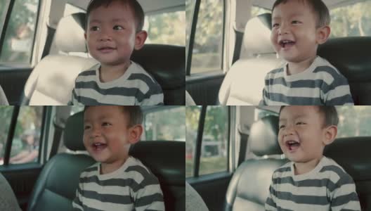 亚洲小男孩乘坐家庭汽车旅行高清在线视频素材下载