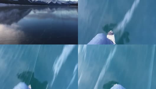在结冰的湖面上滑冰的人高清在线视频素材下载