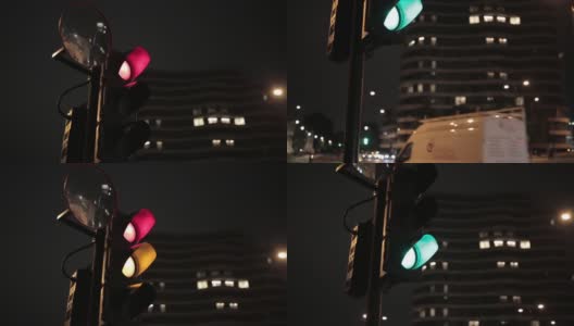 夜景交通灯和移动的车辆高清在线视频素材下载