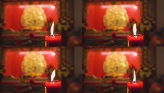 烛光在中国寺庙中燃烧。高清在线视频素材下载