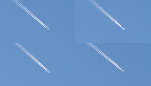 远处的喷气式客机在晴空万里的高空飞行，留下白色的烟雾和尾迹。航空运输的概念高清在线视频素材下载