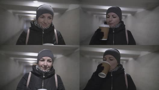 走在隧道里的漂亮女人想起了什么然后在冬天喝咖啡高清在线视频素材下载