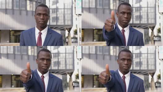 自信成功的黑人商人在户外竖起大拇指高清在线视频素材下载