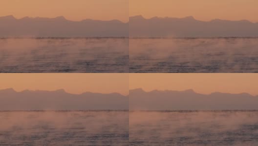 春天日落时，斯匹次卑尔根群岛的北极海岸和山脉。高清在线视频素材下载