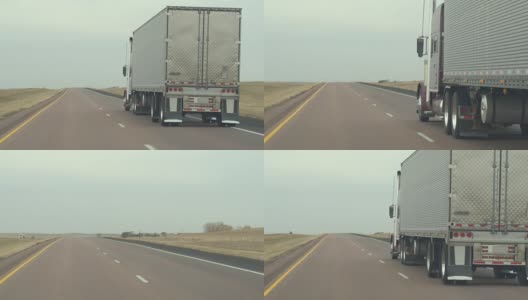 在农村高速公路上，FPV超车载货大型集装箱半挂车高清在线视频素材下载