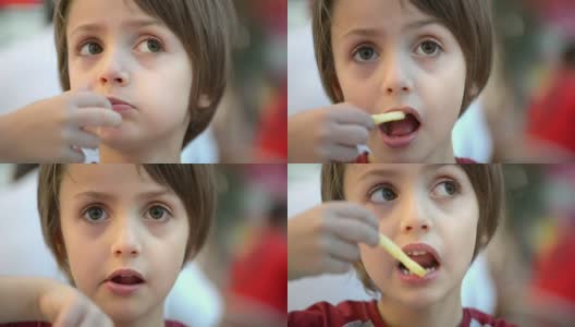 小孩吃炸土豆高清在线视频素材下载