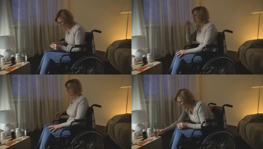 坐轮椅的老太太在吃处方药，在疗养院康复高清在线视频素材下载