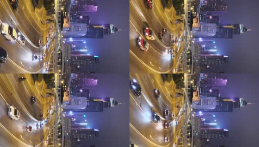 实时垂直拍摄:香港夜晚的城市街道高清在线视频素材下载
