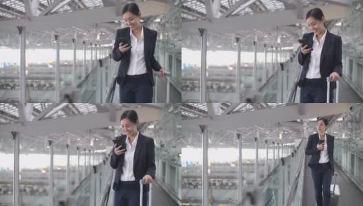 亚洲商务人士在机场使用智能手机高清在线视频素材下载