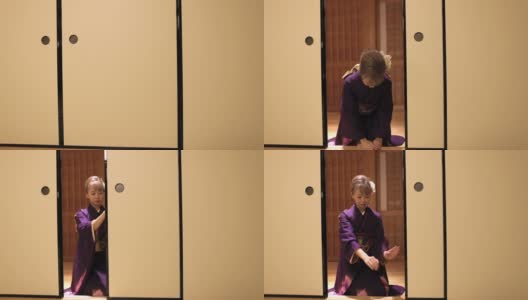 穿着Furisode和服的年轻女子坐在高跟鞋上鞠躬，然后进入日本的榻榻米房间高清在线视频素材下载