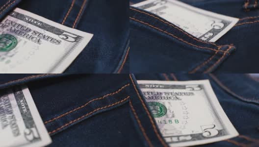 5美元钞票放在牛仔裤口袋里的转盘上。极端特写镜头,高清在线视频素材下载