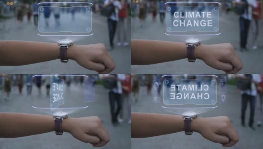 女性的手与全息气候变化高清在线视频素材下载