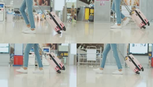 年轻的女游客在机场散步，慢镜头高清在线视频素材下载