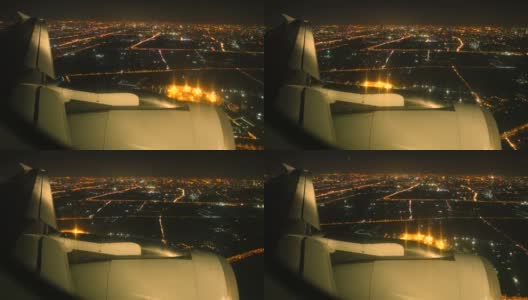 夜晚飞机飞过城市上空高清在线视频素材下载