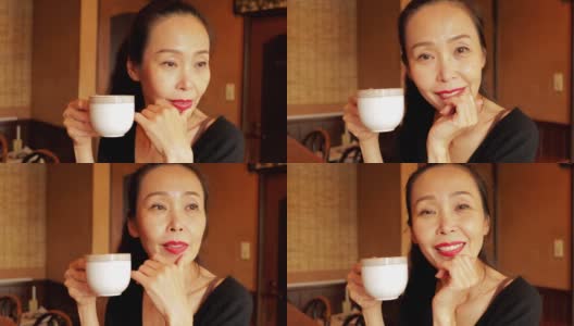 一个正在喝咖啡的日本女人高清在线视频素材下载