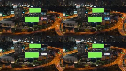 4K时间推移:广告牌绿色屏幕与城市夜间交通灯背景。泰国曼谷。4 k决议。高清在线视频素材下载