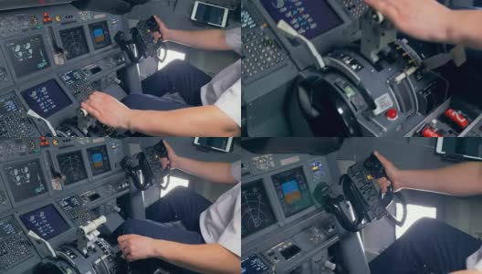专业飞行员通过调节油门杆和控制轮来驾驶飞机高清在线视频素材下载