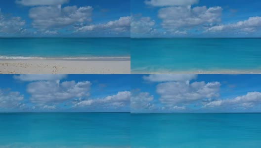 特克斯和凯科斯群岛，普罗维登夏莱斯，格雷斯湾海滩的无人机上升空中高清在线视频素材下载