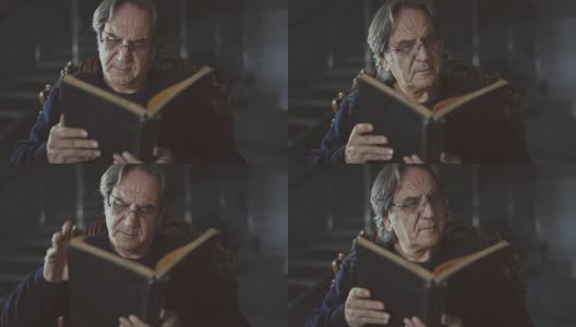 一个正在读书的老人的肖像高清在线视频素材下载