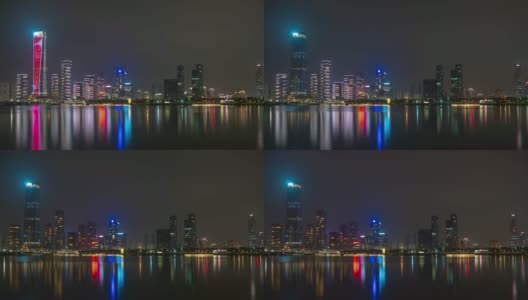 夜光照亮了深圳城市景观著名的人才园湖畔全景，4k时间跨度的中国高清在线视频素材下载