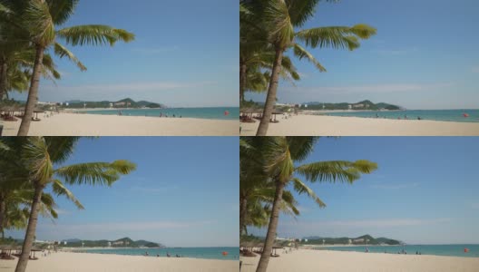 三亚市晴天大东海海滩慢镜头全景4k海南中国高清在线视频素材下载